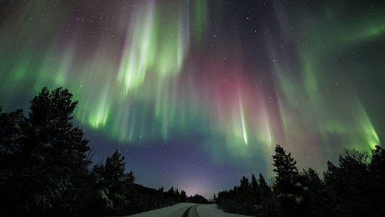 Crazy auroras including red. Taken by Rayann Elzein on January 8, 2022 @ Utsjoki, Finnish Lapland 